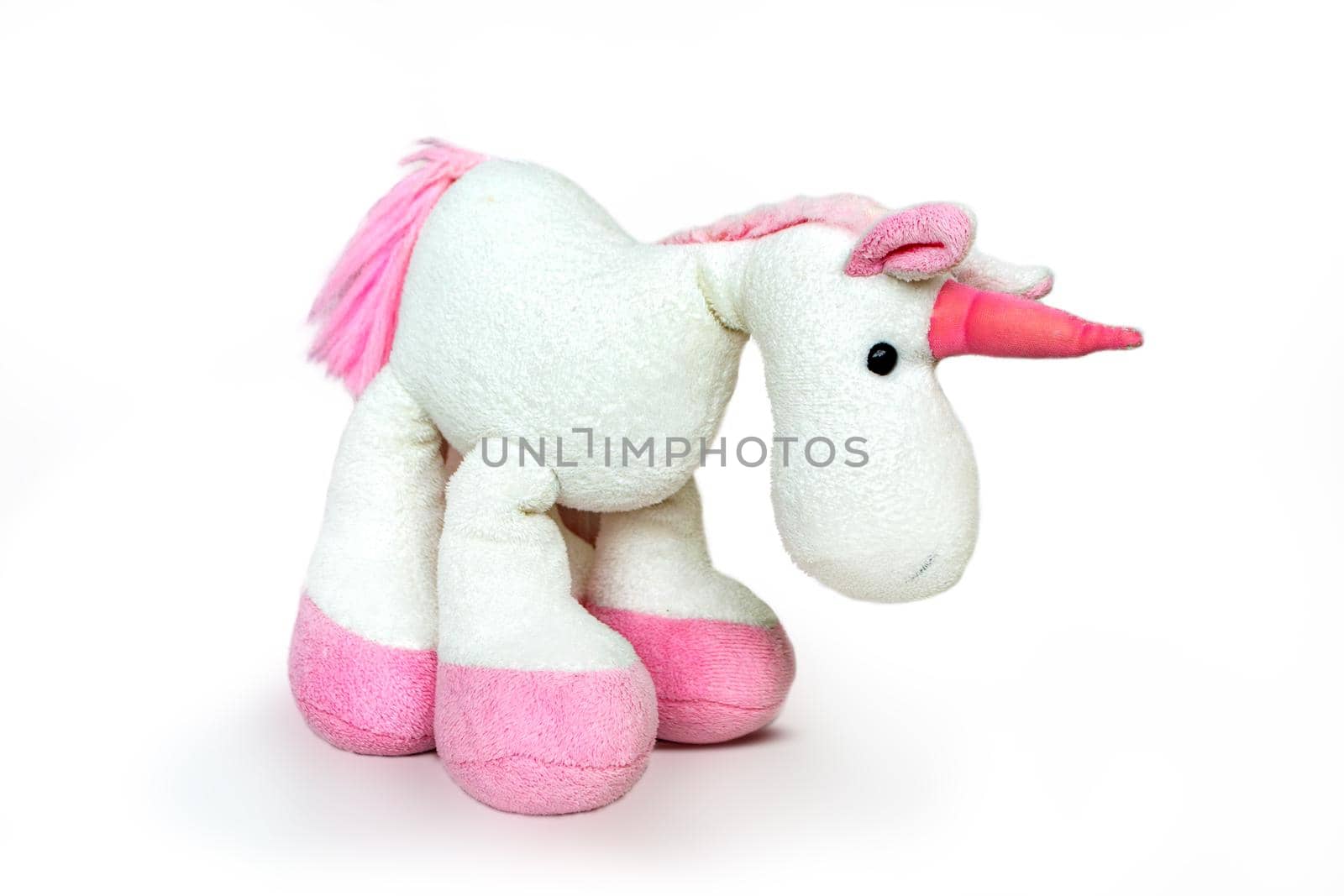 Lovely brown white pony isolated on white background. Adorable teddy bear for decorative. High quality photo