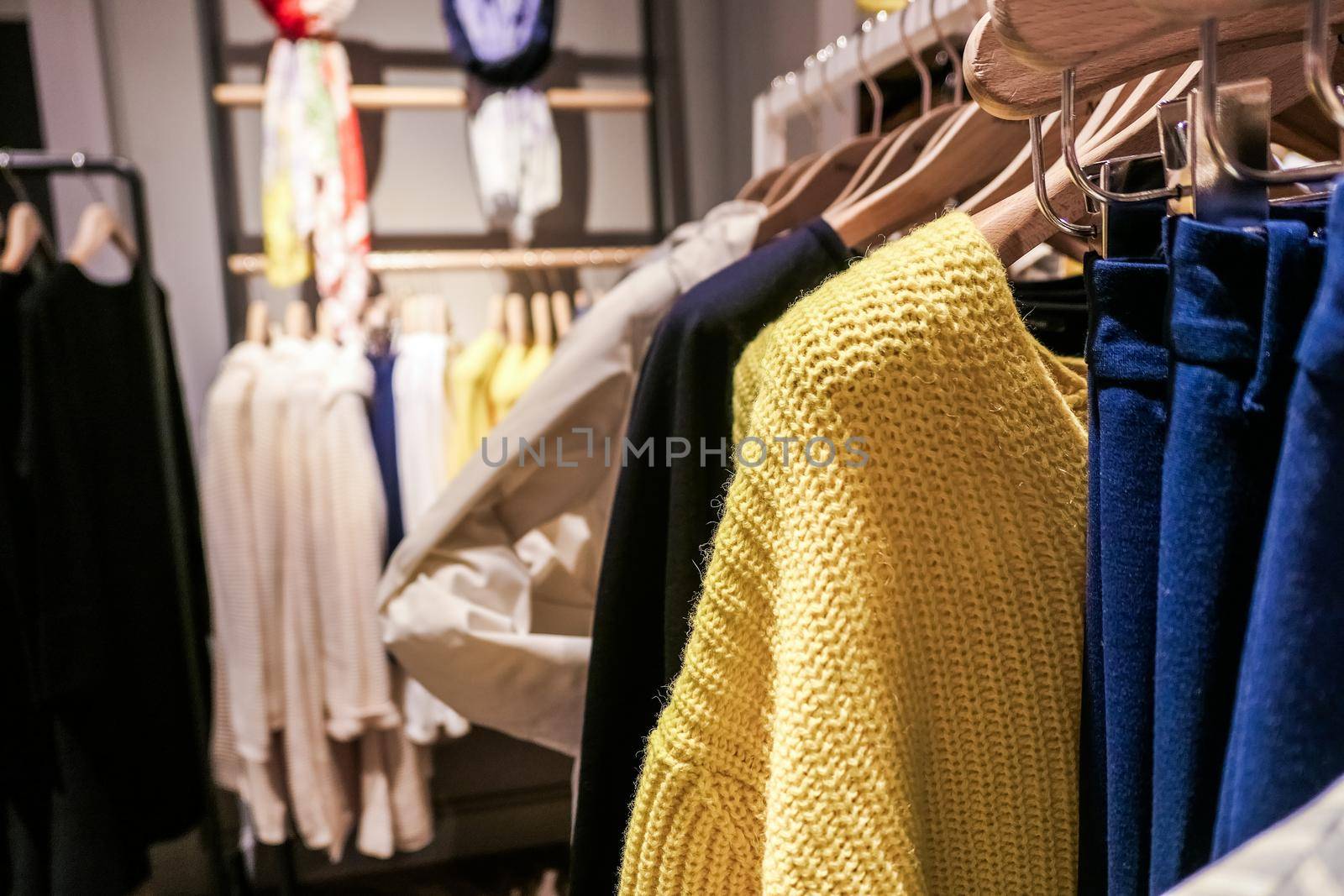 Style, fashion shop and shopping concept - Fashionable casual clothes in a boutique store