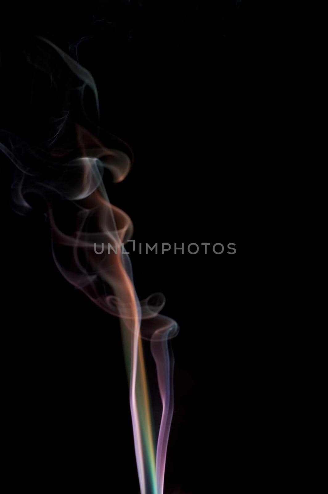 a plume of colorful swirling smoke trails