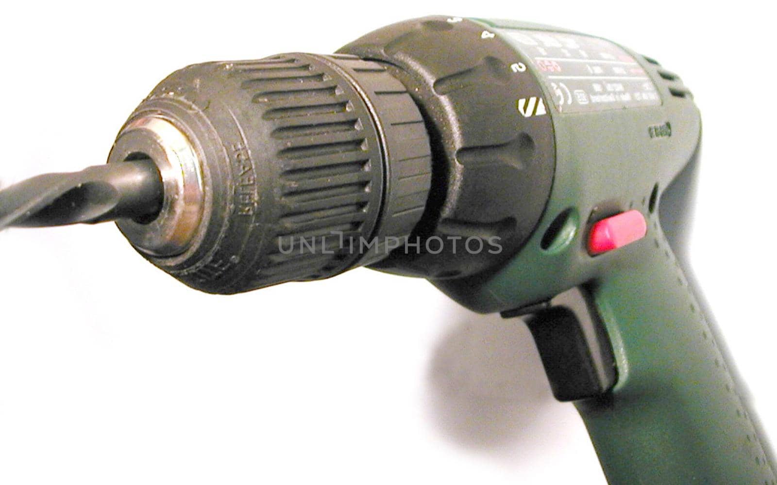 Close Up Detail of Electric Drill with Bit on White Background