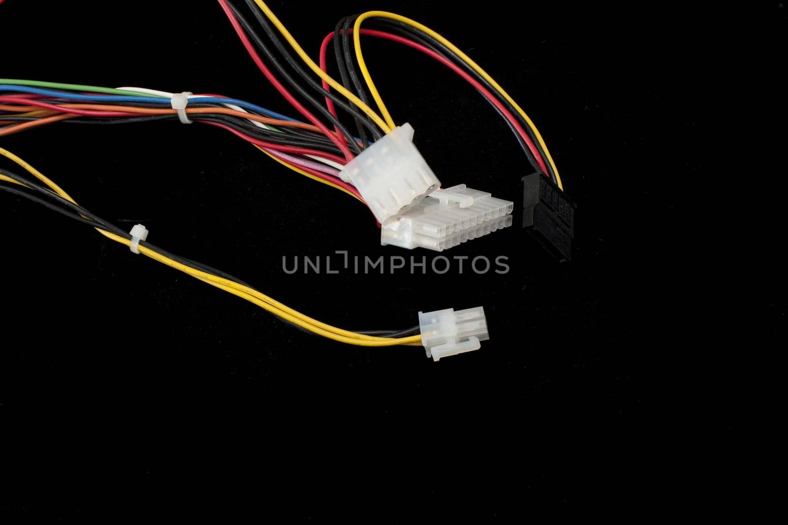 ATX Molex power connector plugs with wires isolated on black background