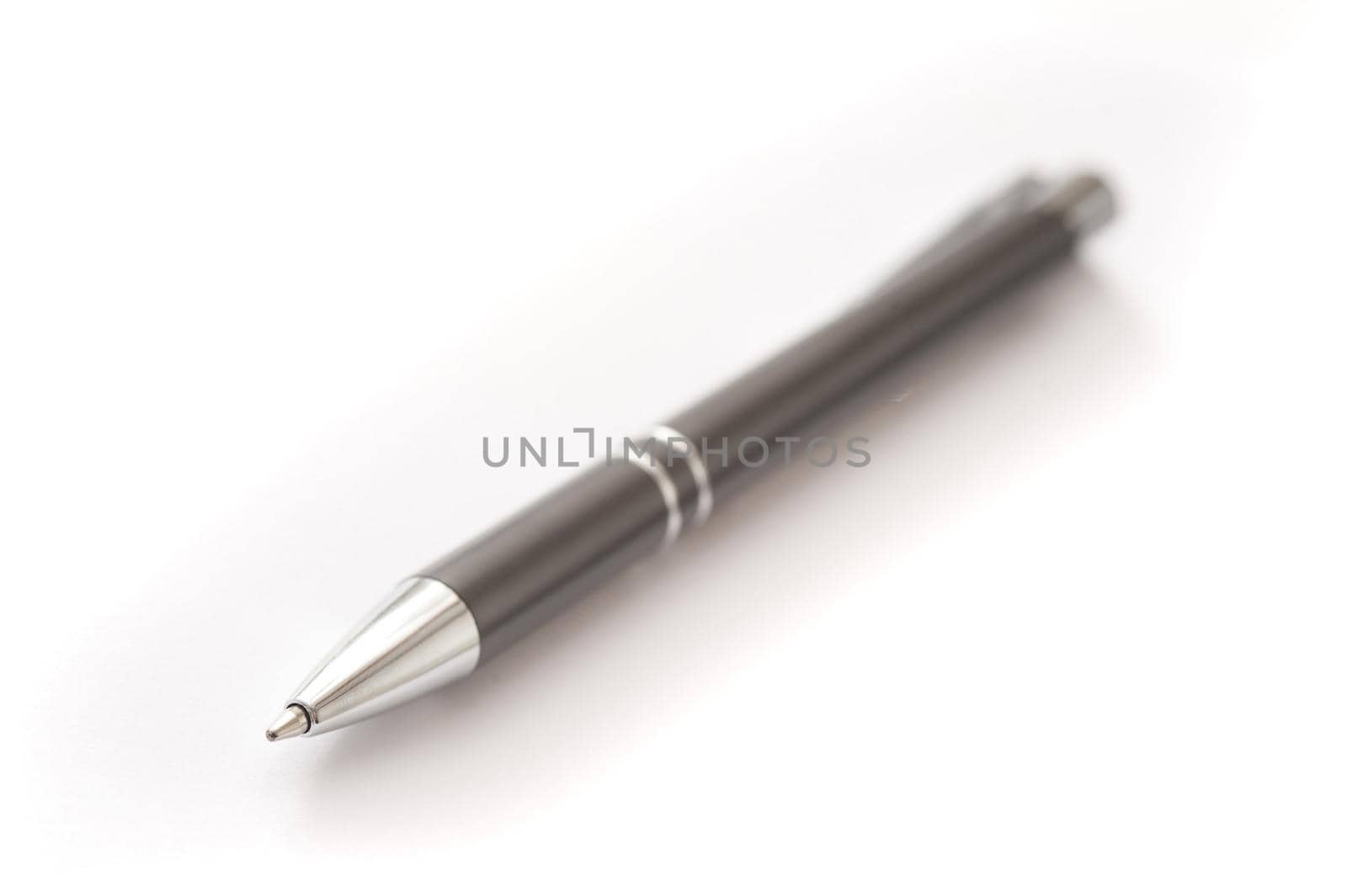 Close up Single Black Ballpoint Pen or Biro Isolated on White Background