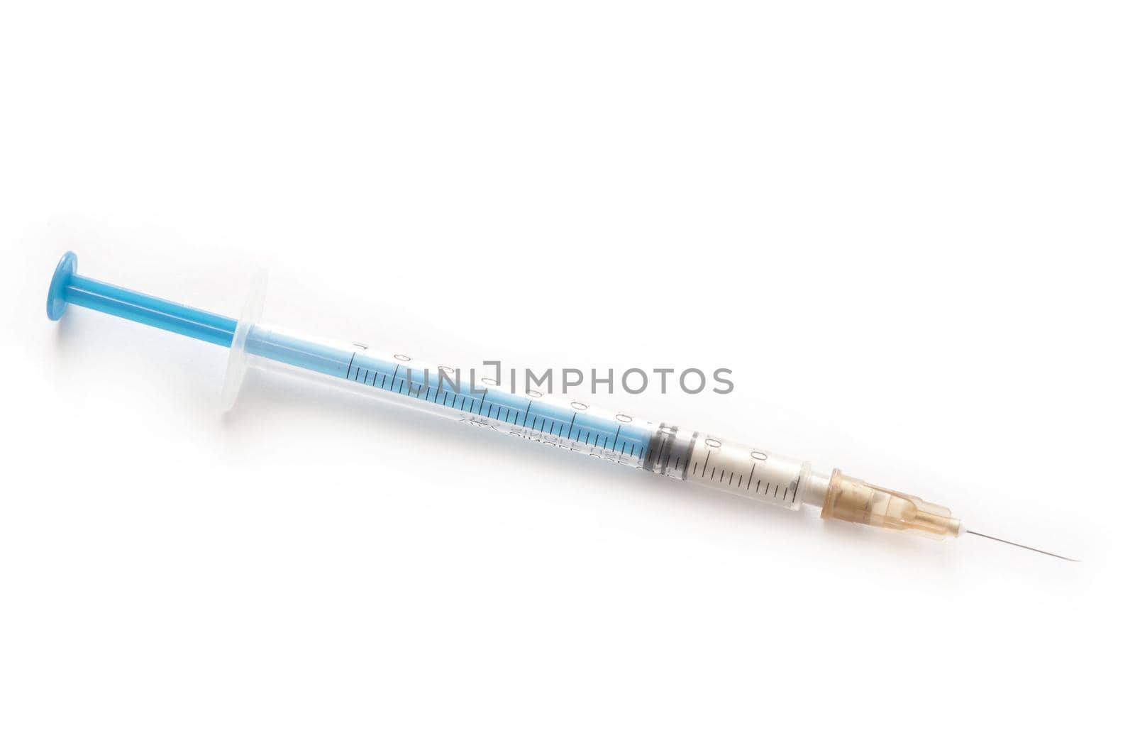 Small disposable syringe and needle for subcutaneous or intramuscular application of liquid medication such as insulin in chronic diabetes, isolated on white