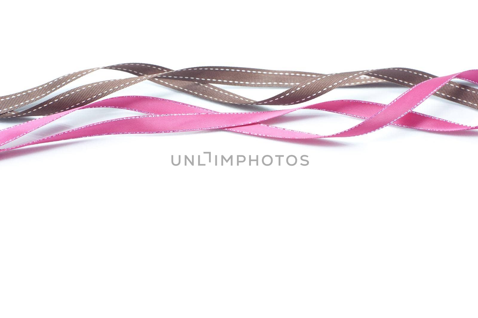 a background composed of twisted ribbons on a white backdrop