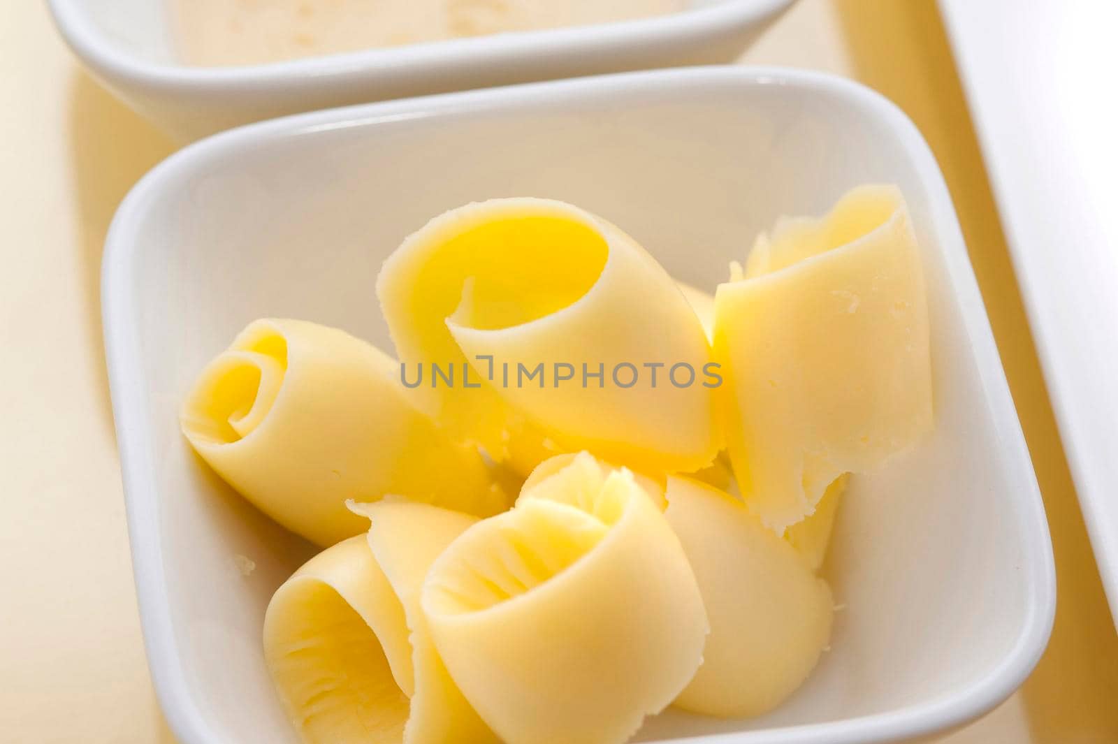 Closeup of coiled butter rolls in a dish to be served as an accompaniment to a meal or bread rolls