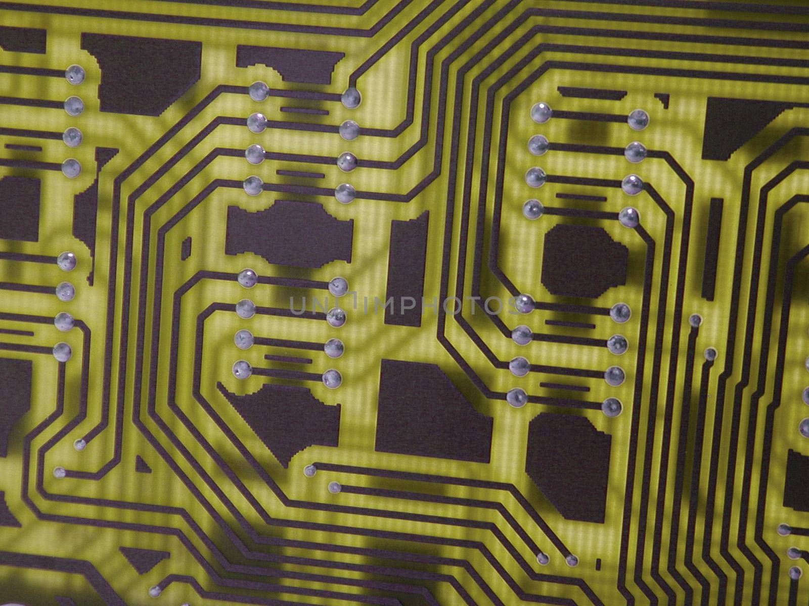 Closeup of an integrated electronic circuit board showing motherboard