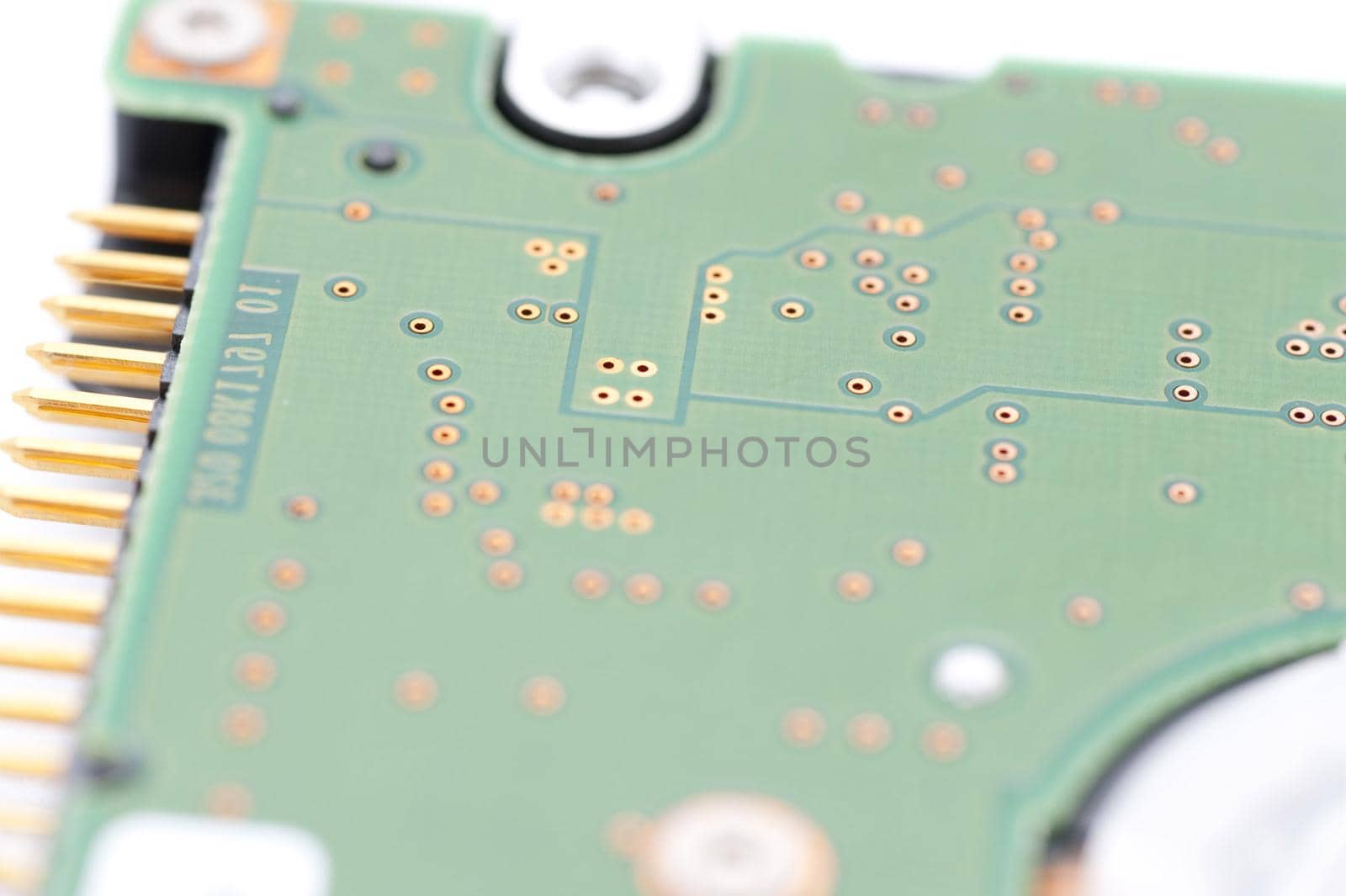 Hard disk drive close-up with IDE connector pins in focus