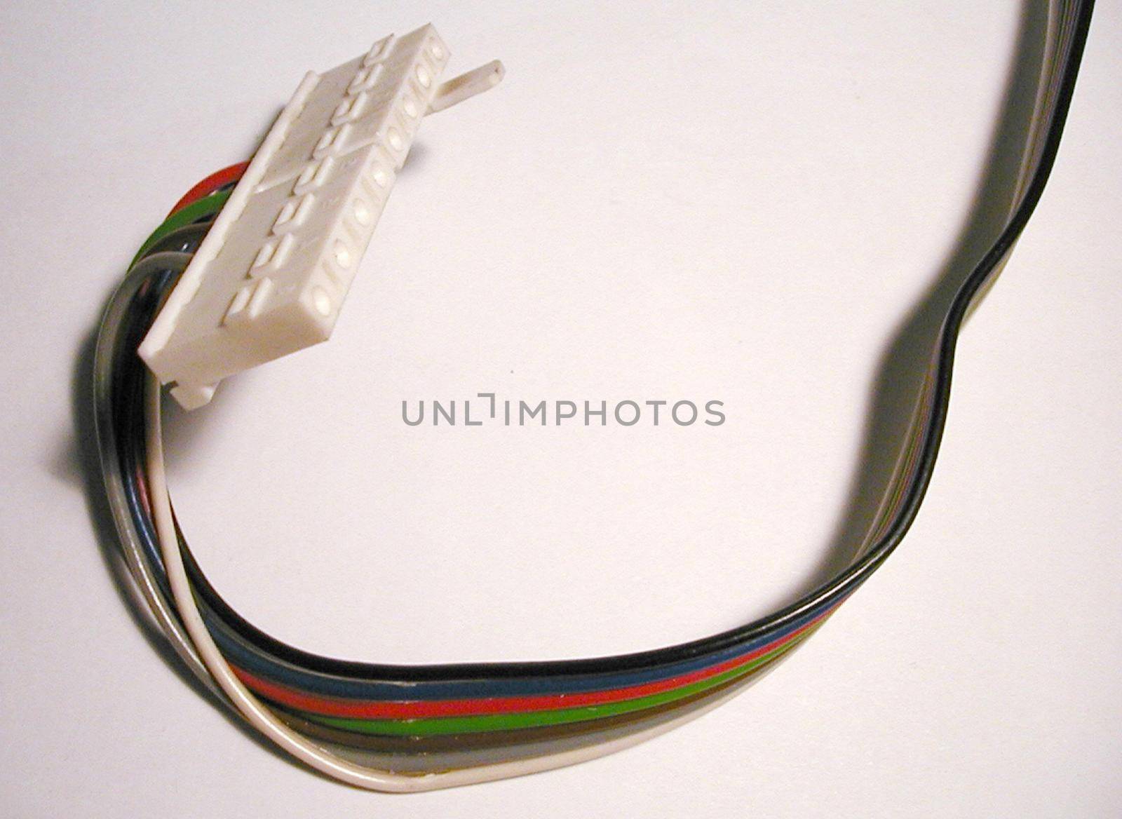 A multiway header connector and wire on white background