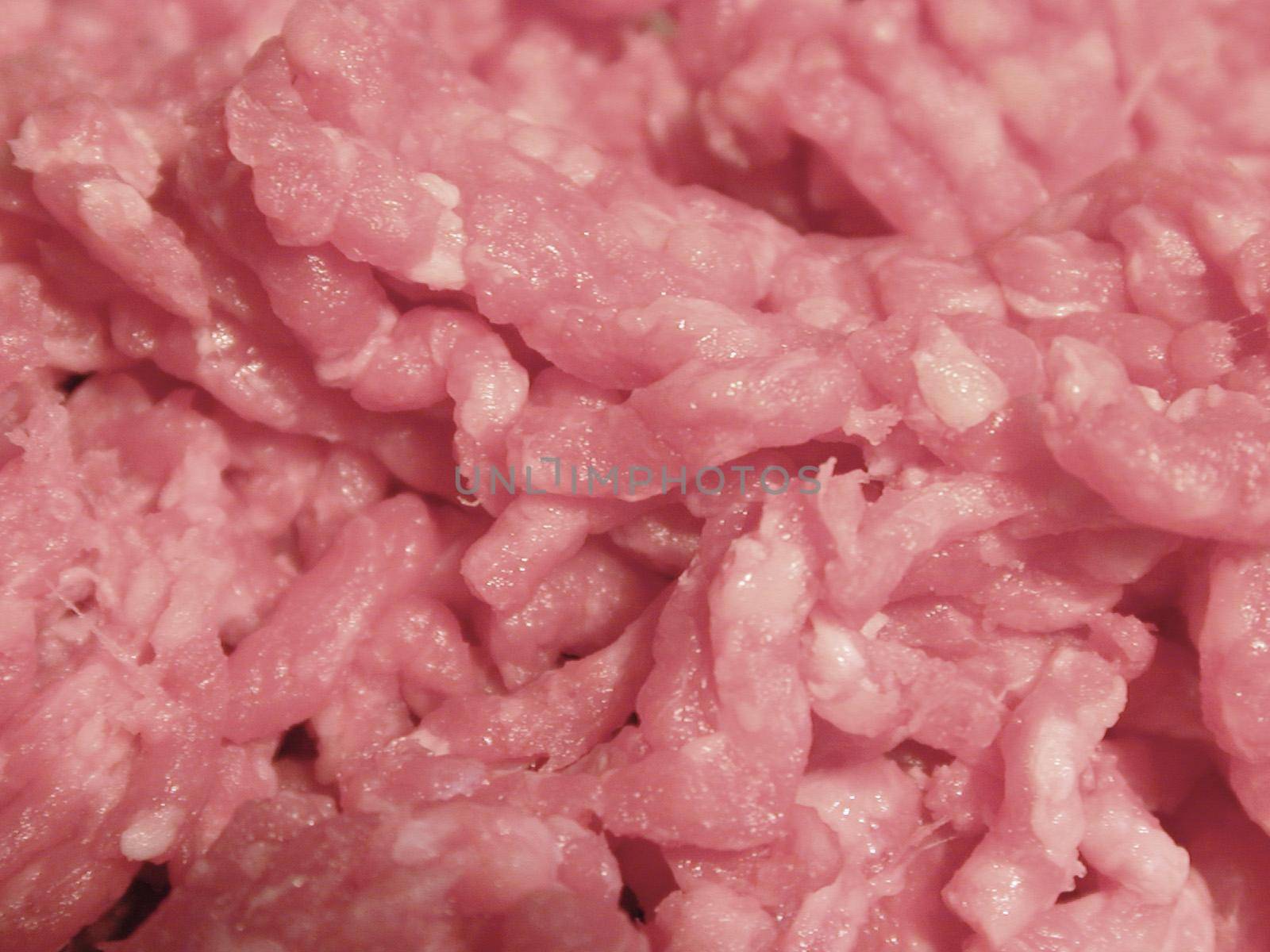 Background texture of raw mince meat by sanisra