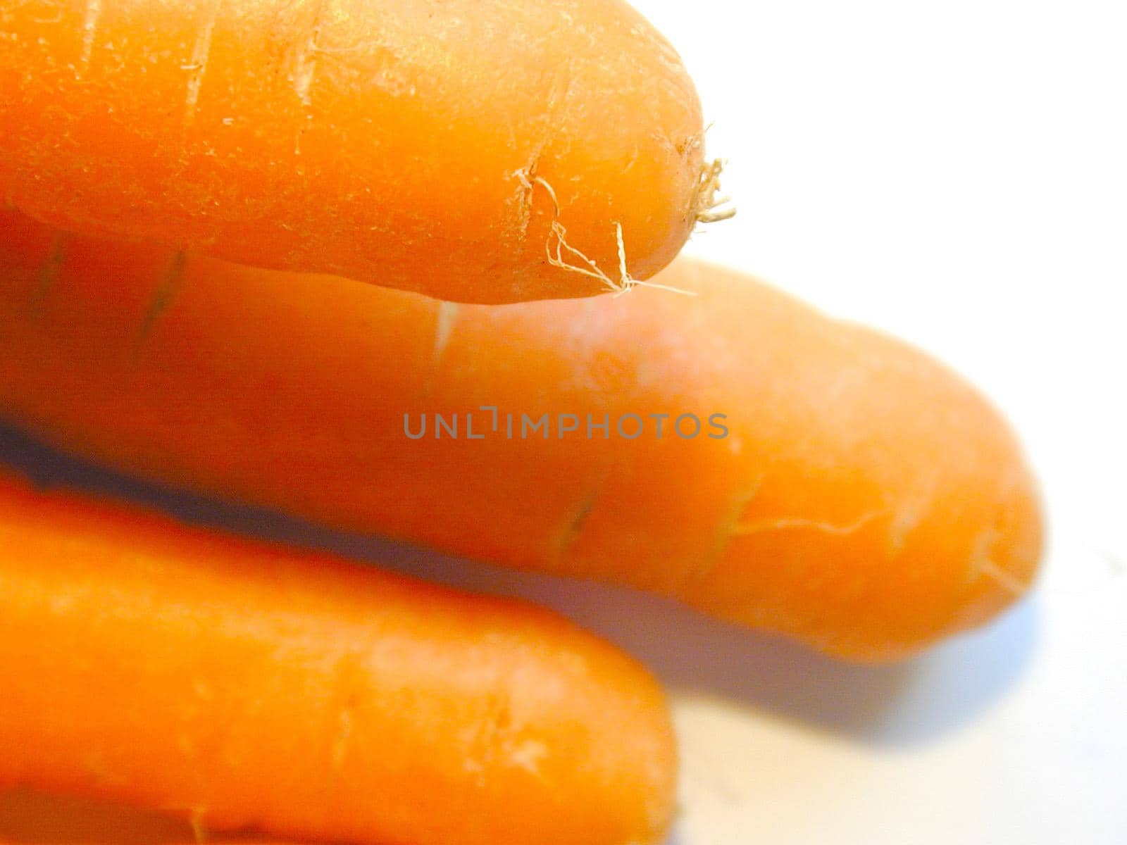 Close up texture of fresh raw carrots by sanisra