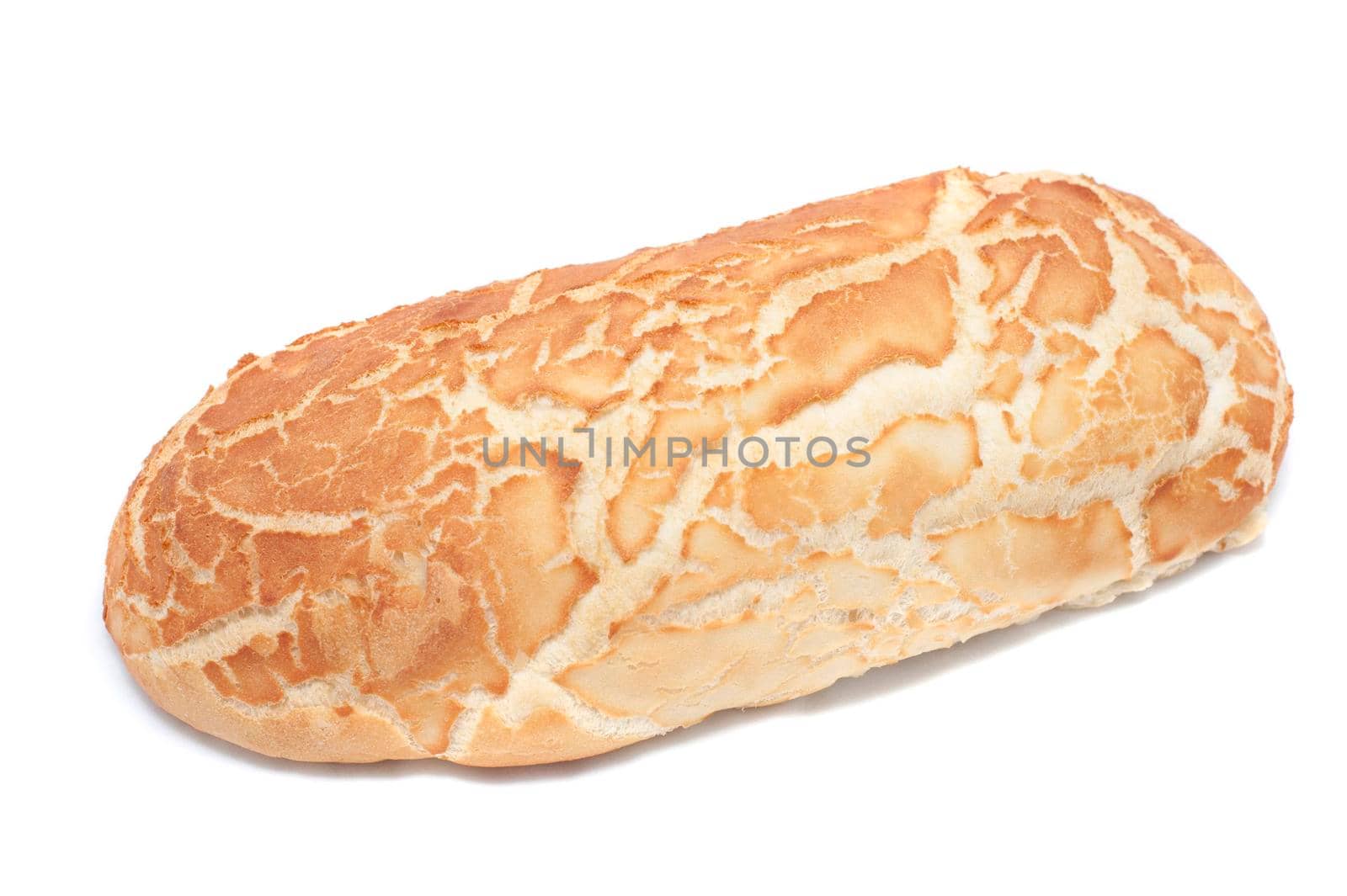 Golden freshly baked loaf of crusty bread from a bakery on a white background