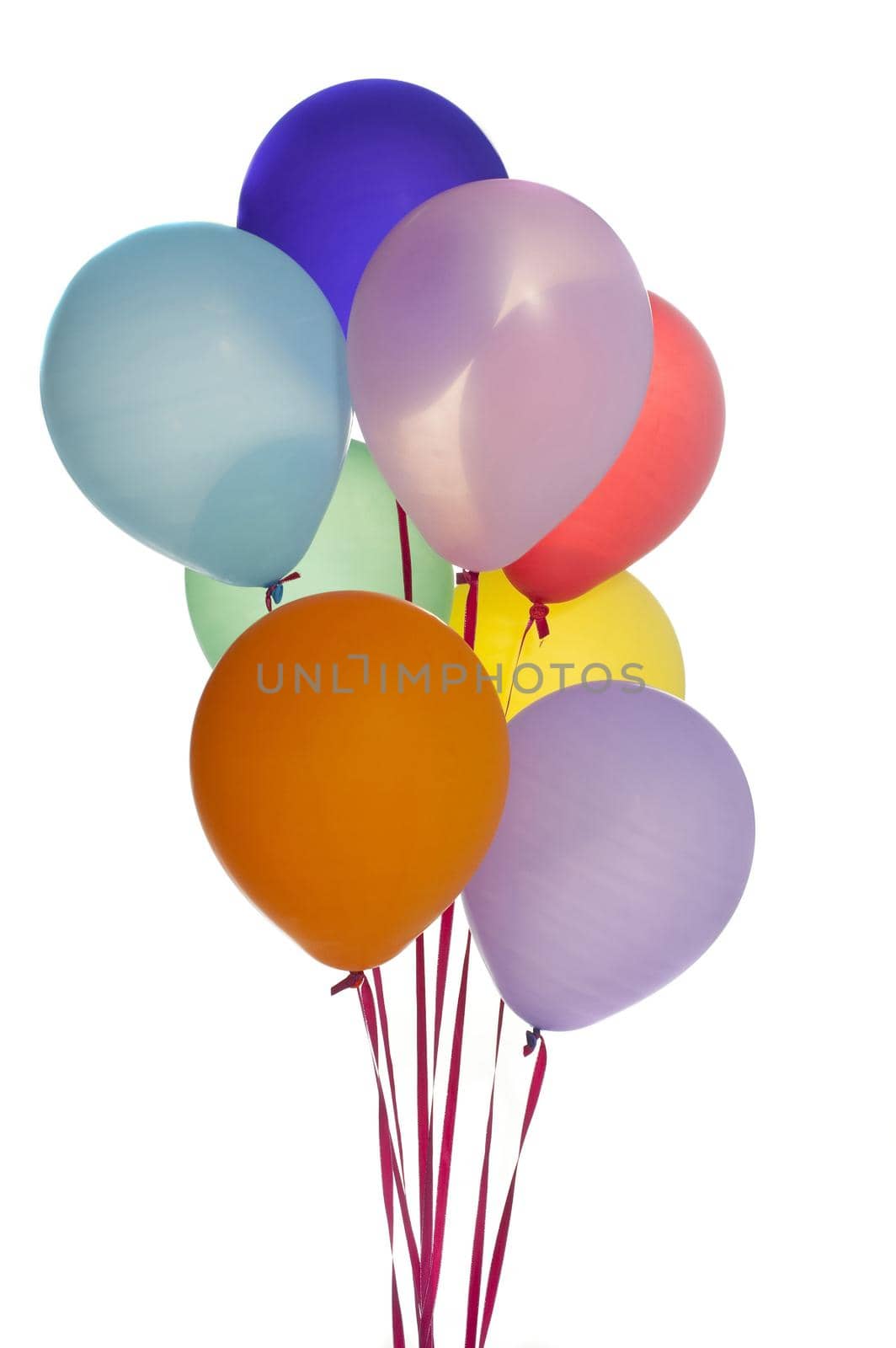 Close up Colored Balloons on Ties Isolated on White Background, Emphasizing Copy Space.