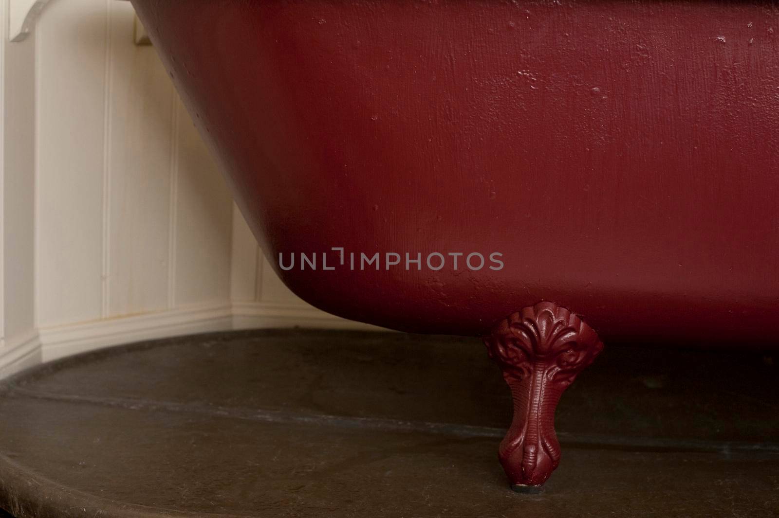 decortaive foot on an old style cast iron bath tub