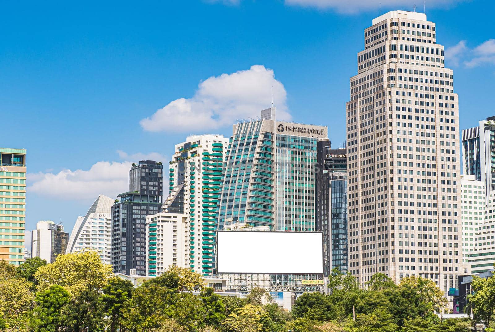 Blank Billboard mock up of Skyscraper for Advertising in city metropolitan. by Petrichor