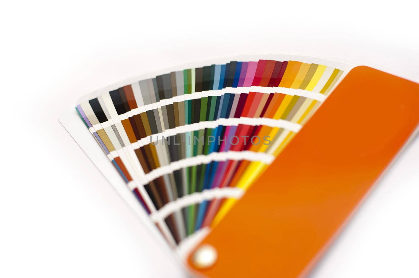 Opened color chart for painting or interior decorating fanned to show the colors of the spectrum in various hues and shades, on white