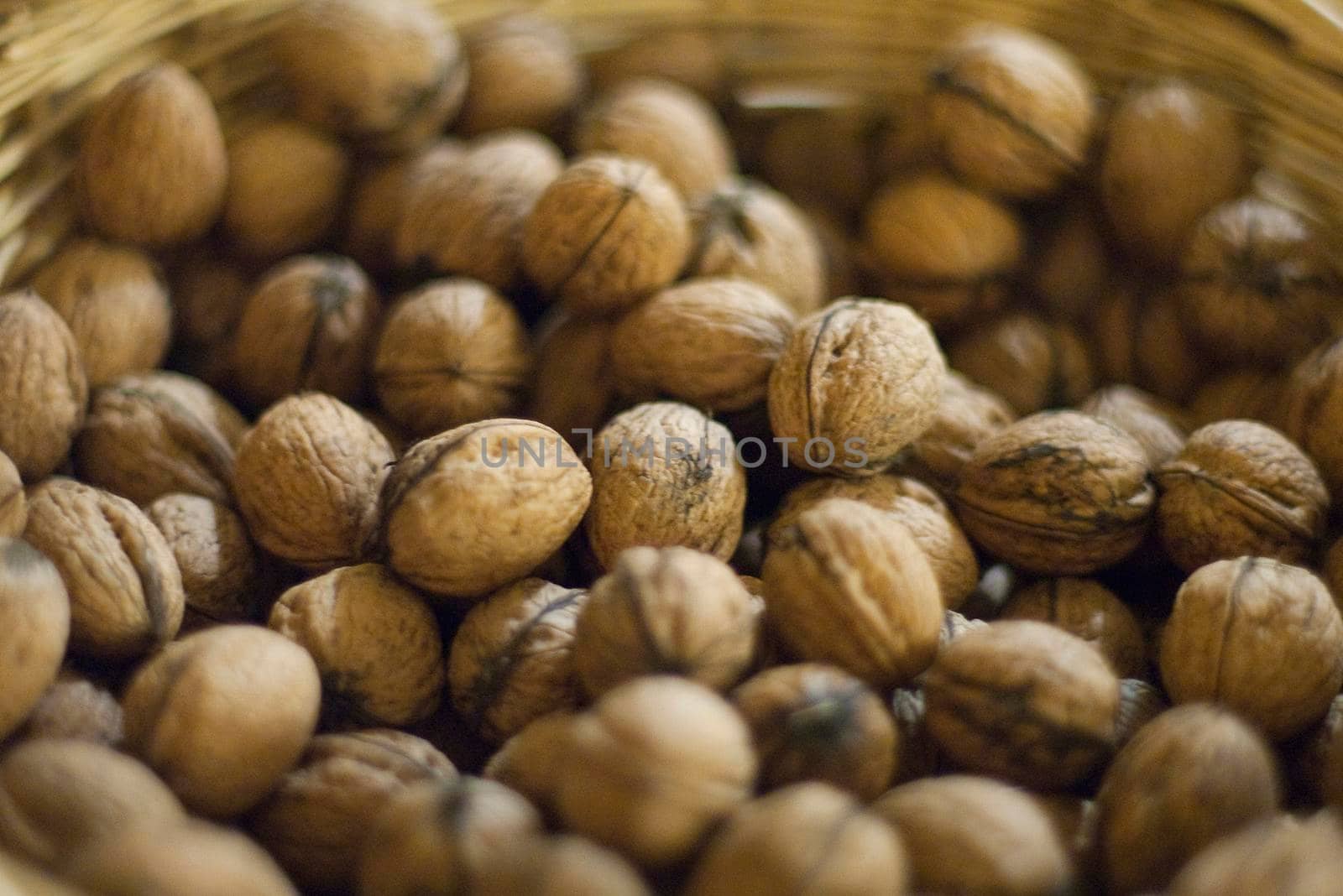 a bowl of wallnuts pictured with a narrow depth of field