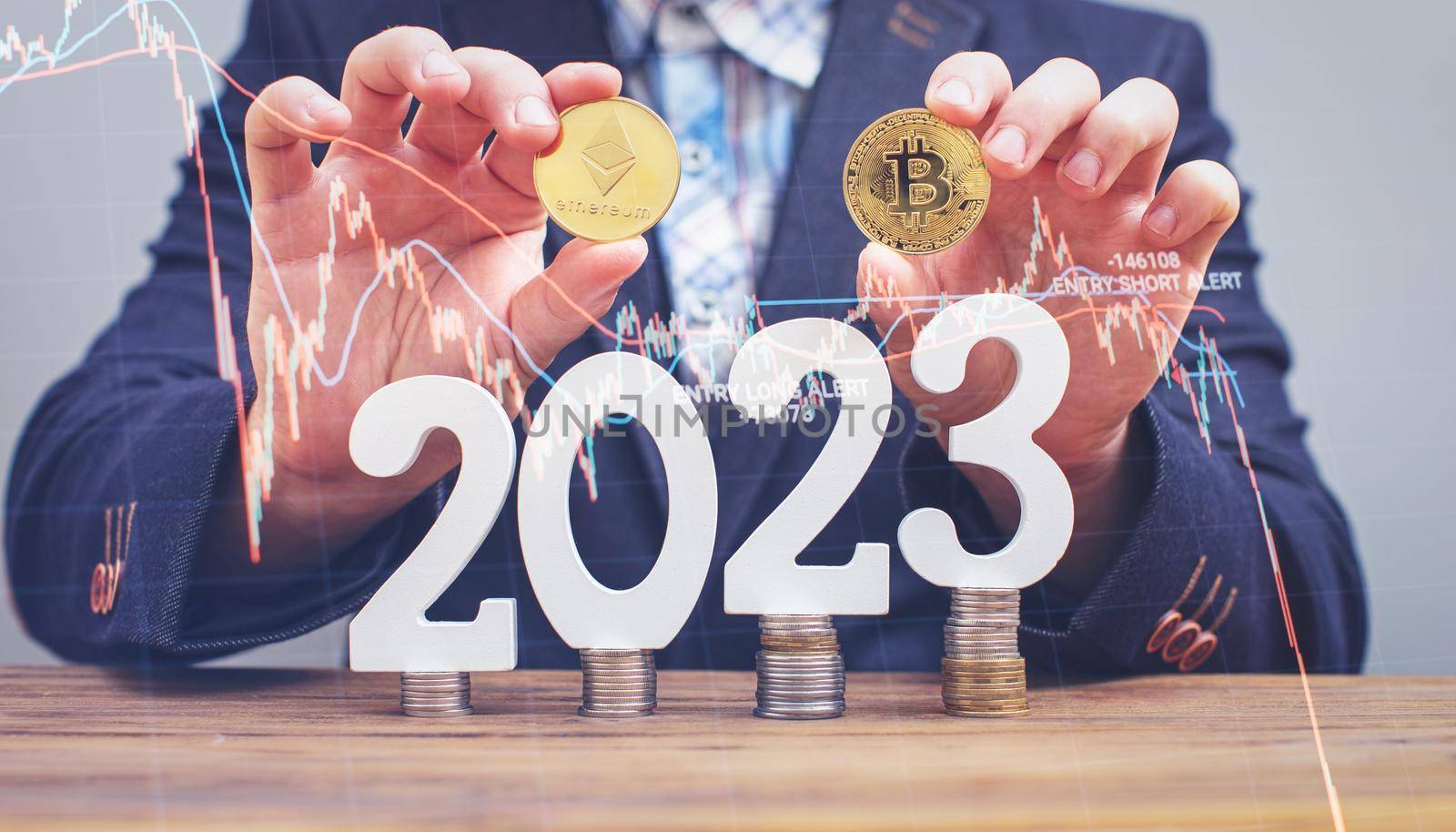 Businessman thinking about investing in cryptocurrency in 2023, choice between Ethereum and Bitcoin against the background of the chart by Maximusnd