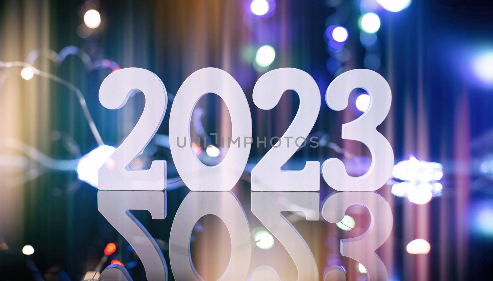 2023 New Year Celebration Blurred lights in the background. by Maximusnd