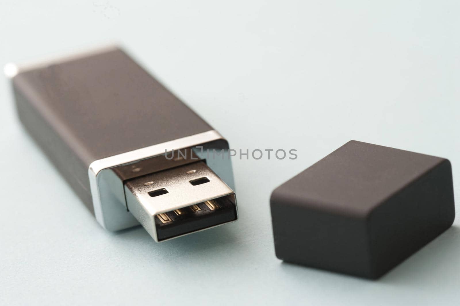 Open portable computer memory flash drive with focus to the universal USB connection or plug