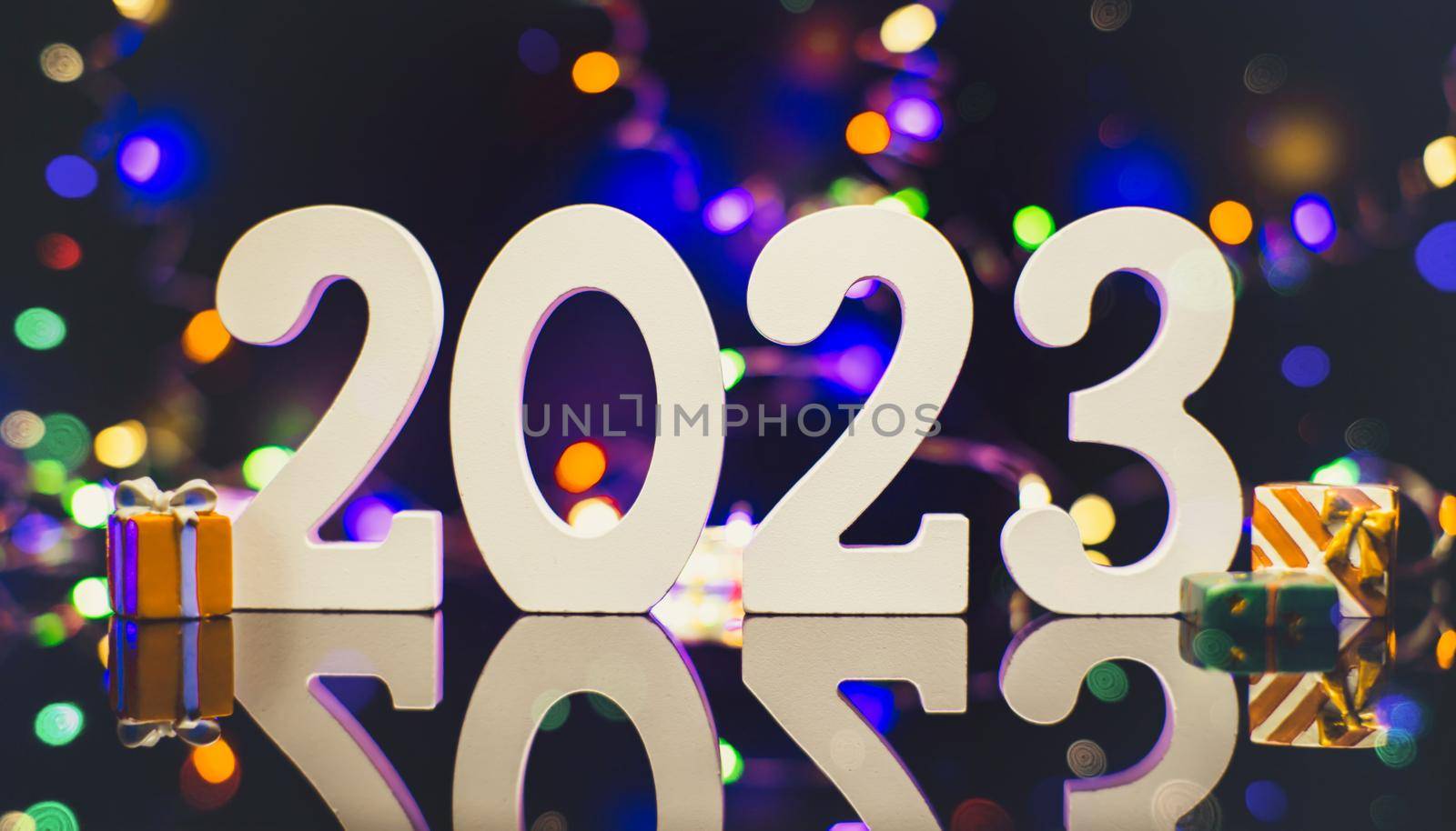 2023 New Year Celebration Blurred lights in the background. by Maximusnd