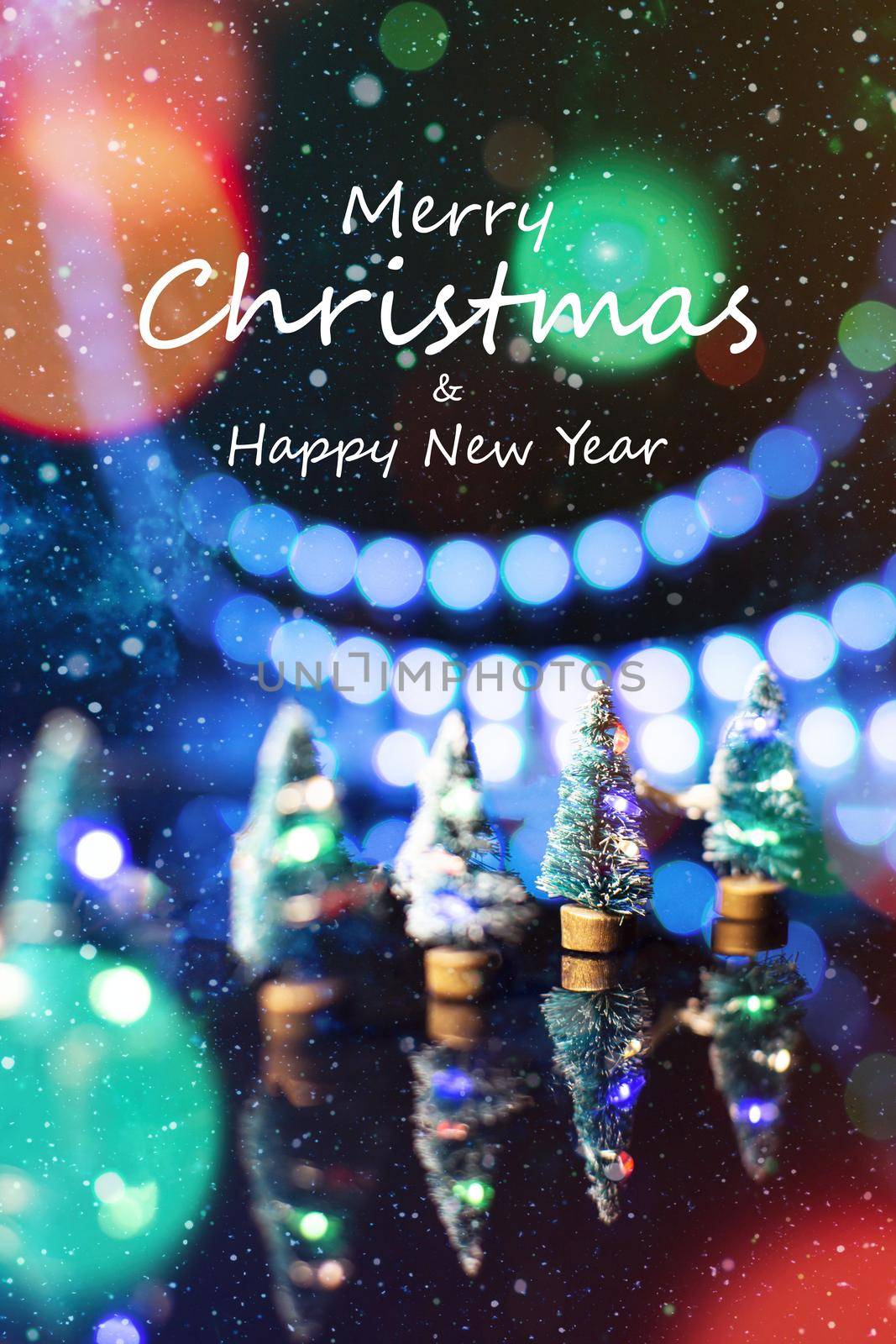 Merry Christmas & Happy New Year Text Design Over Magical Blue Defocused Bokeh Lights . Christmas Card with Glittering Festive Holiday Background by Maximusnd