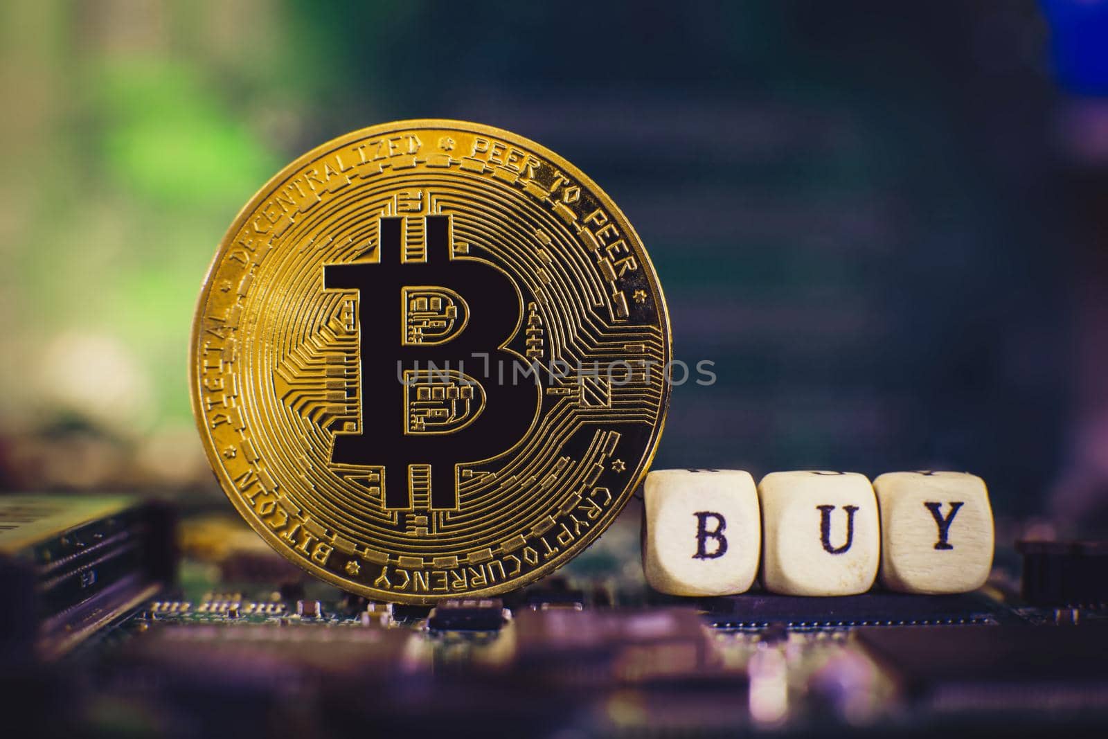 Golden coins with bitcoin symbol buy on a mainboard. Stock Market Concept, digital money and stock business. by Maximusnd