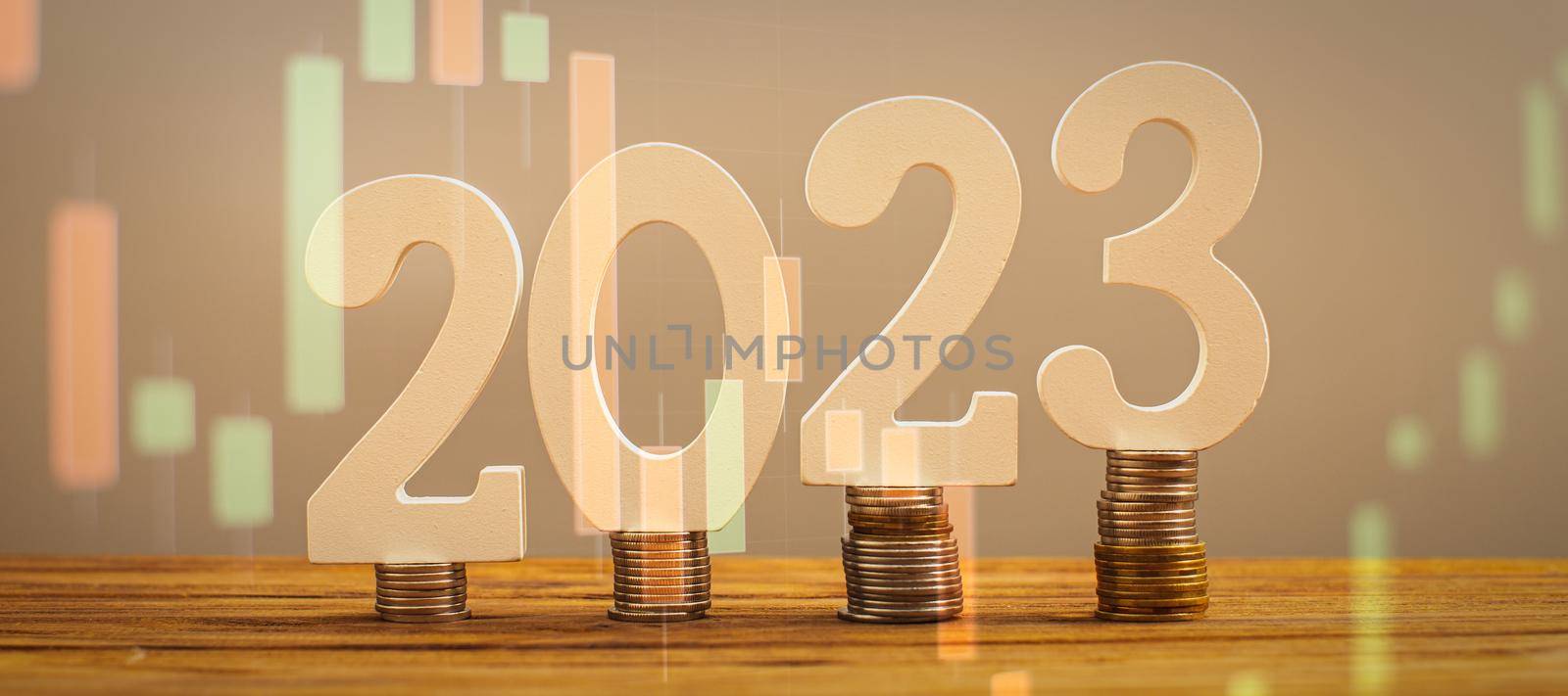 2023 on the stack of coins. tax payment, investment, and banking concept. 2023 new year saving money and financial planning concept by Maximusnd