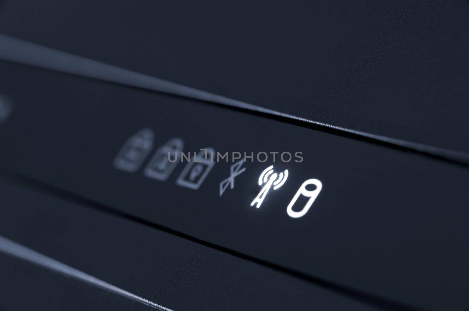 indicator lights on a laptop, hard disk access and wireless network service