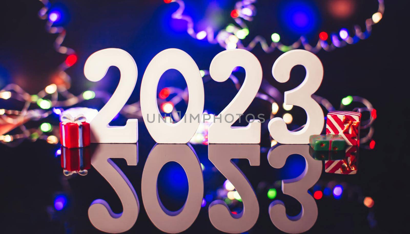 2023 New Year Celebration Blurred lights in the background. by Maximusnd