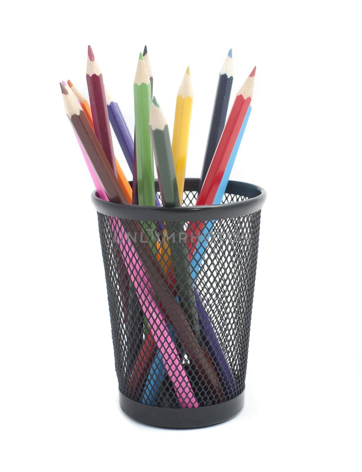 Colouring pencils in a metal container desk tidy ready for colouring in, drawing or handicraft