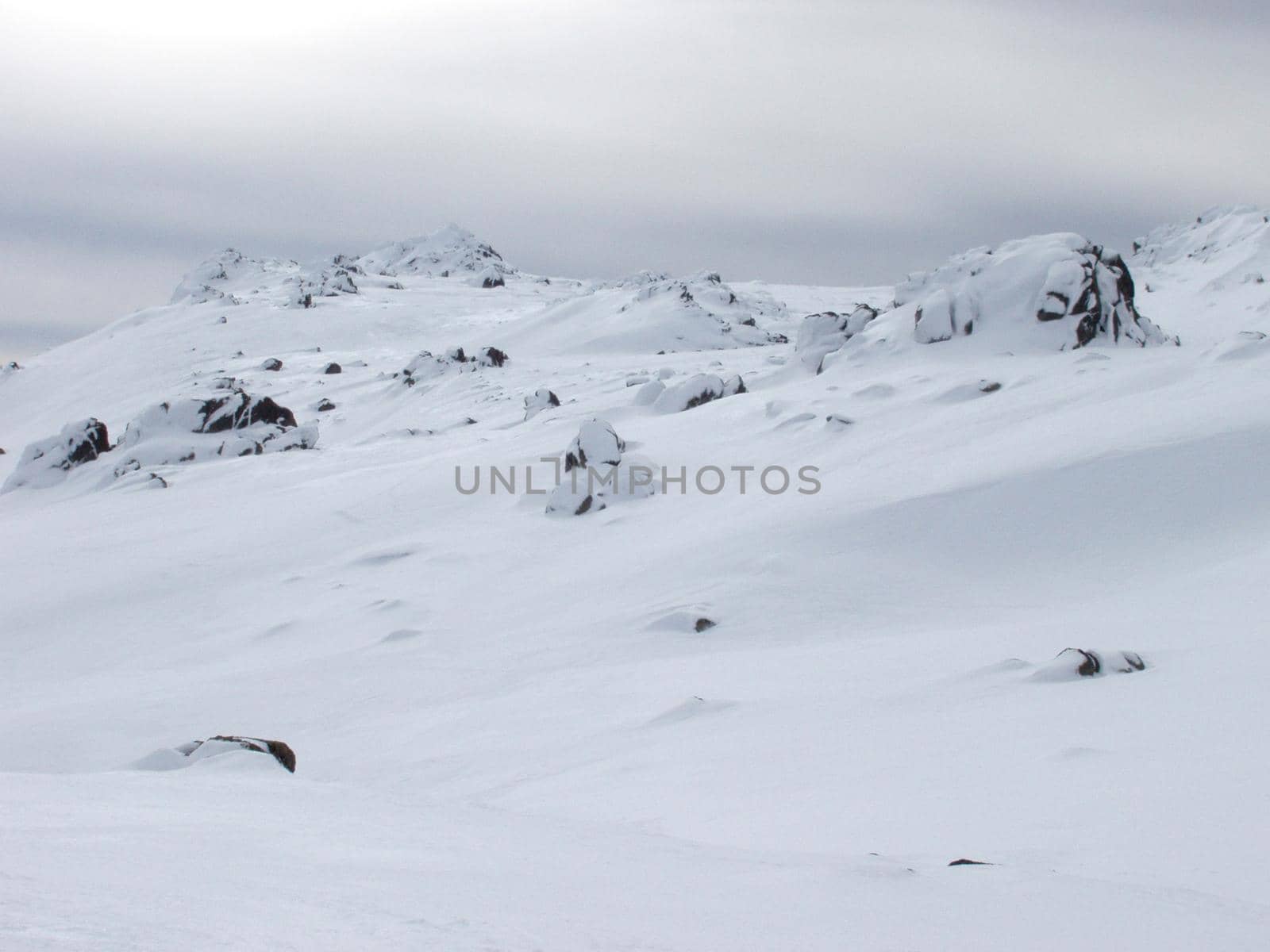 alpine scene with a thick covering of clean white snow