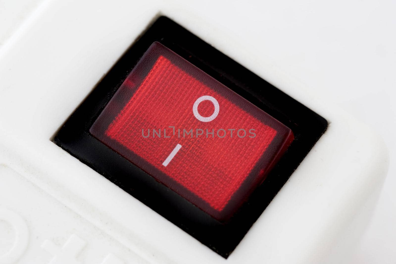 a red neon power switch in the on position
