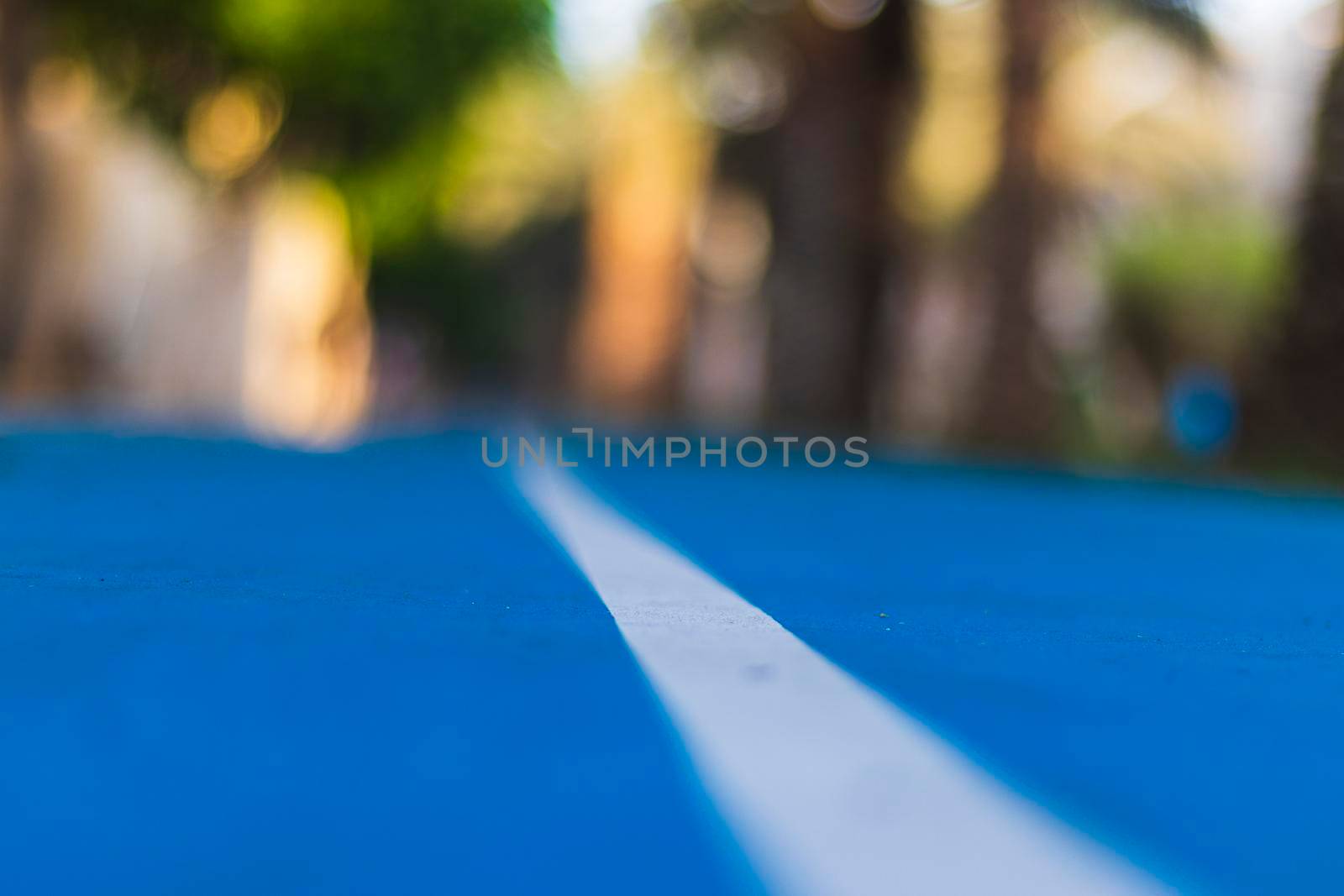 Dividing line in cycling track. Abstract by pazemin