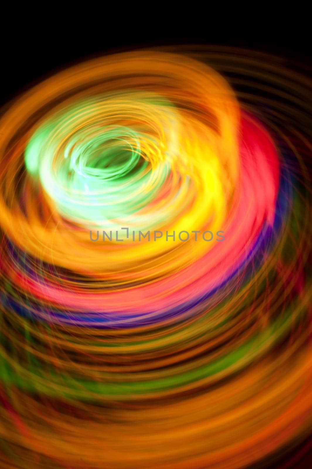 an unusual and vibrant image of colourful light trails