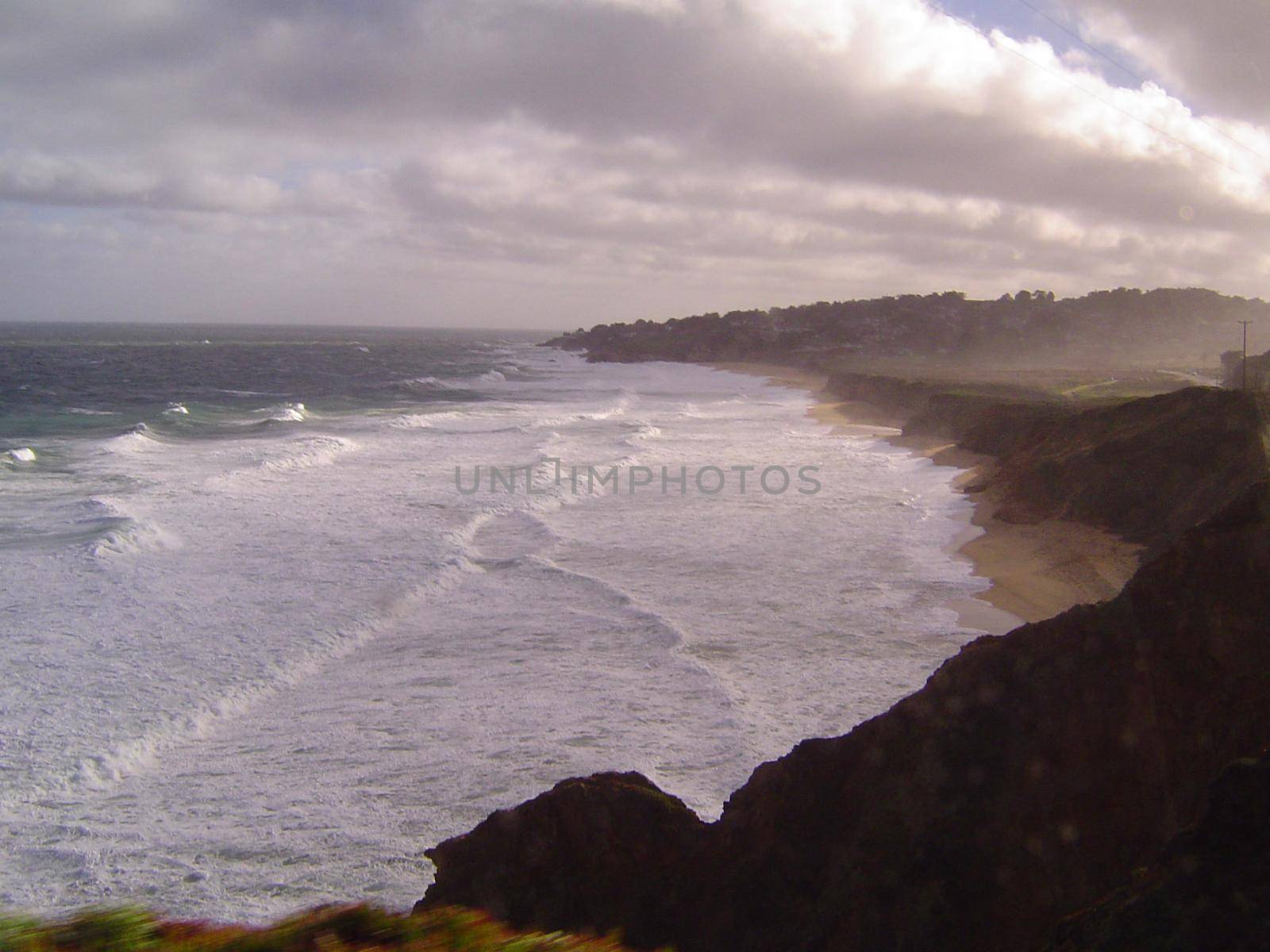 waves breaking on the california coast