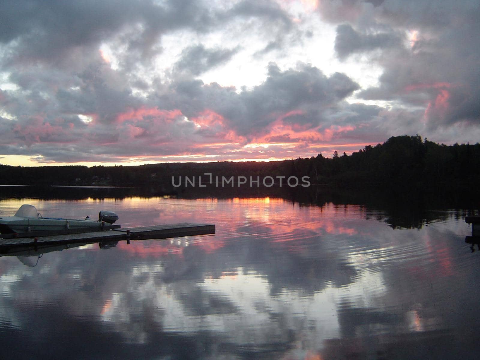 sunset over a lake in Algonquin provincial park, Ontario, Canada