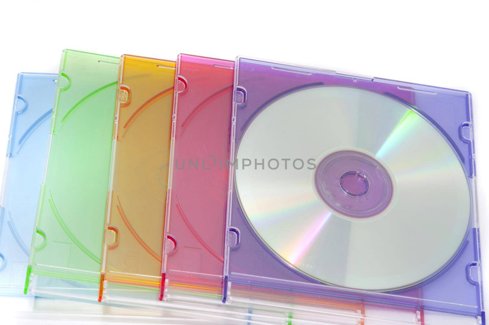 Close up Pile of Colorful Compact Disc Cases Isolated on White Background