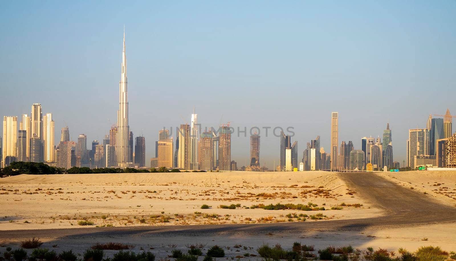 Sunrise over a skyline of a beautiful city of Dubai. Shot made in Jadaf area of the city. UAE. by pazemin