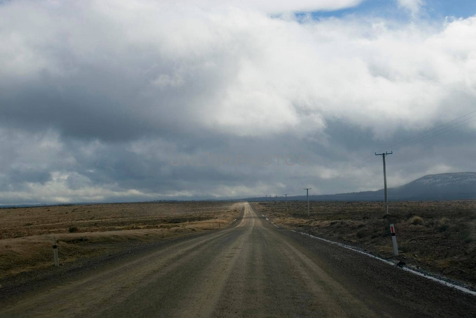 long dirt road in tasmanias great lakes region
