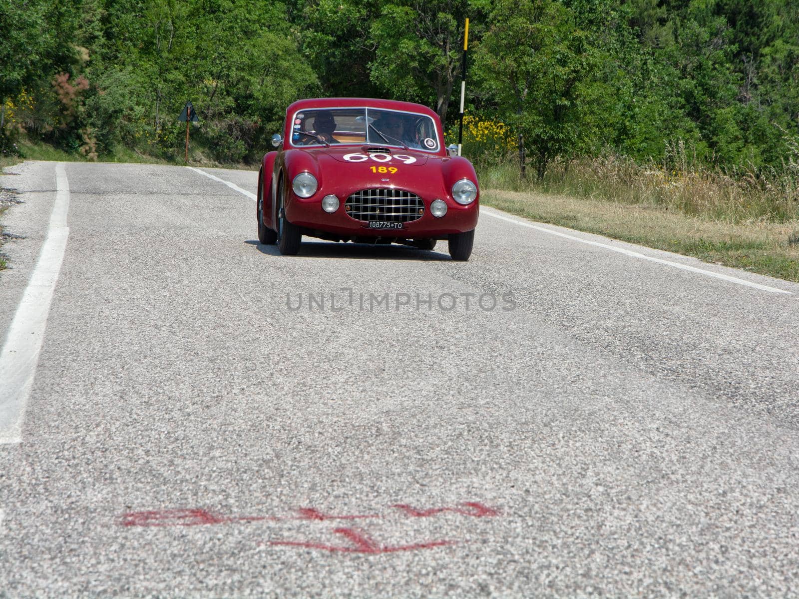 URBINO - ITALY - JUN 16 - 2022 : ERMINI 1100 BERLINETTA MOTTO 1950 on an old racing car in rally Mille Miglia 2022 the famous italian historical race (1927-1957