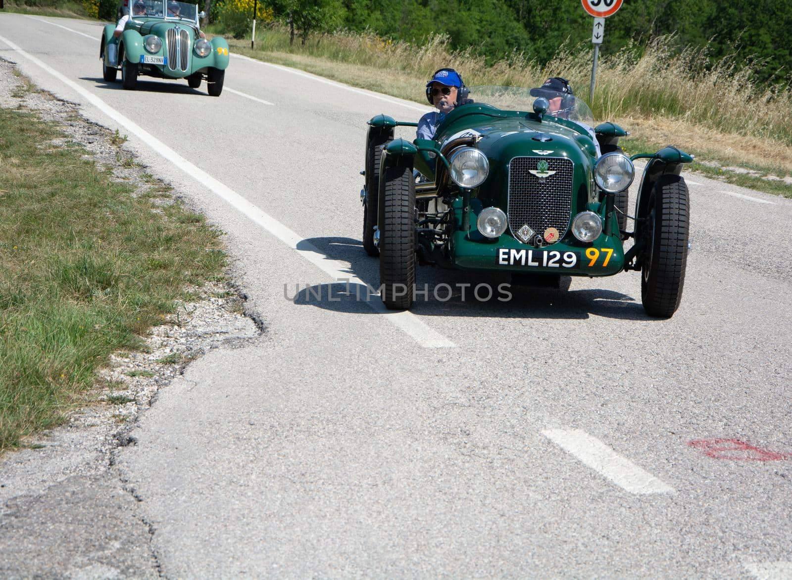 URBINO - ITALY - JUN 16 - 2022 : ASTON MARTIN 2 LITRE SPEED MODEL SPA SPECIAL 1936 on an old racing car in rally Mille Miglia 2022 the famous italian historical race (1927-1957