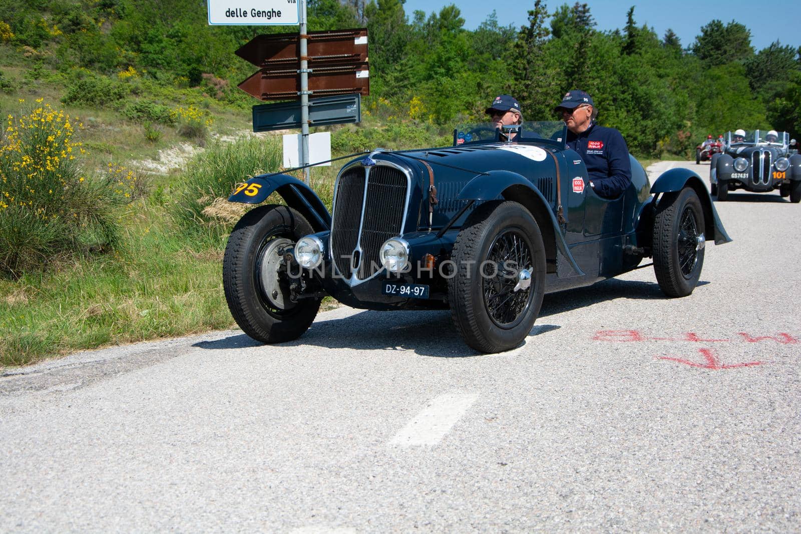 URBINO - ITALY - JUN 16 - 2022 : DELAHAYE 135 CS 1936 on an old racing car in rally Mille Miglia 2022 the famous italian historical race (1927-1957