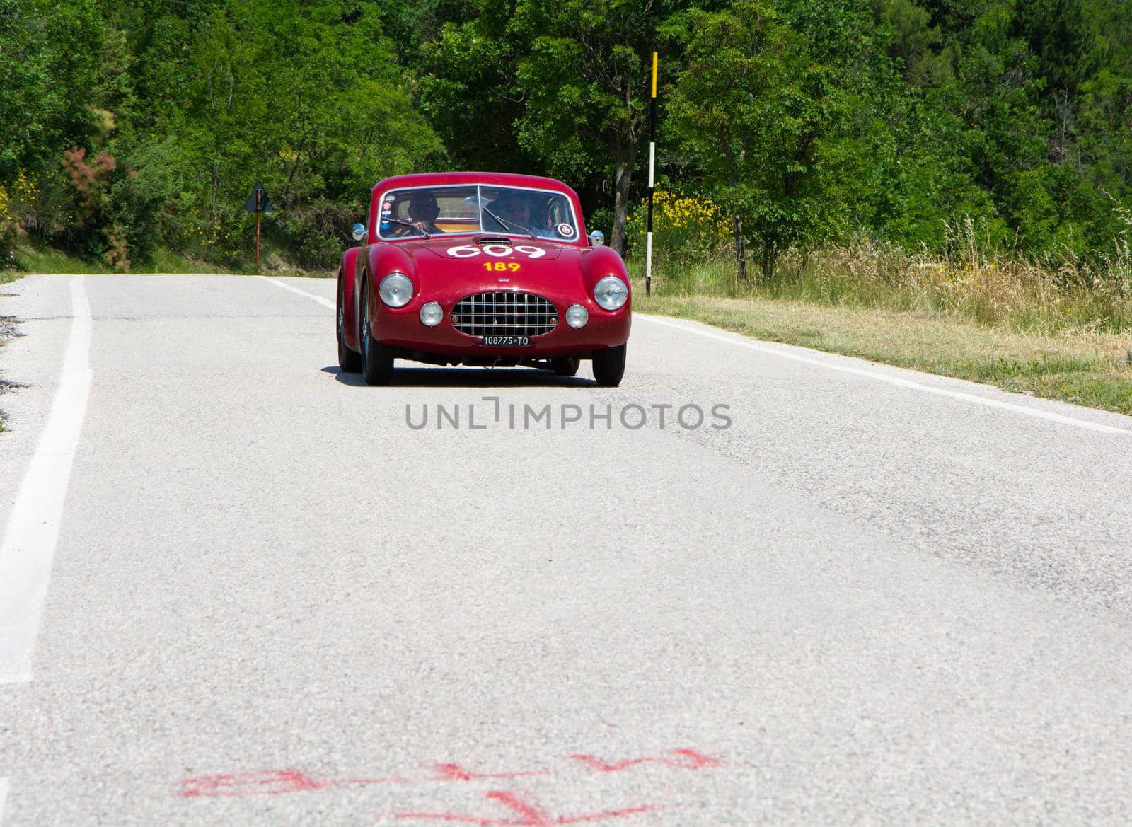 URBINO - ITALY - JUN 16 - 2022 : ERMINI 1100 BERLINETTA MOTTO 1950 on an old racing car in rally Mille Miglia 2022 the famous italian historical race (1927-1957