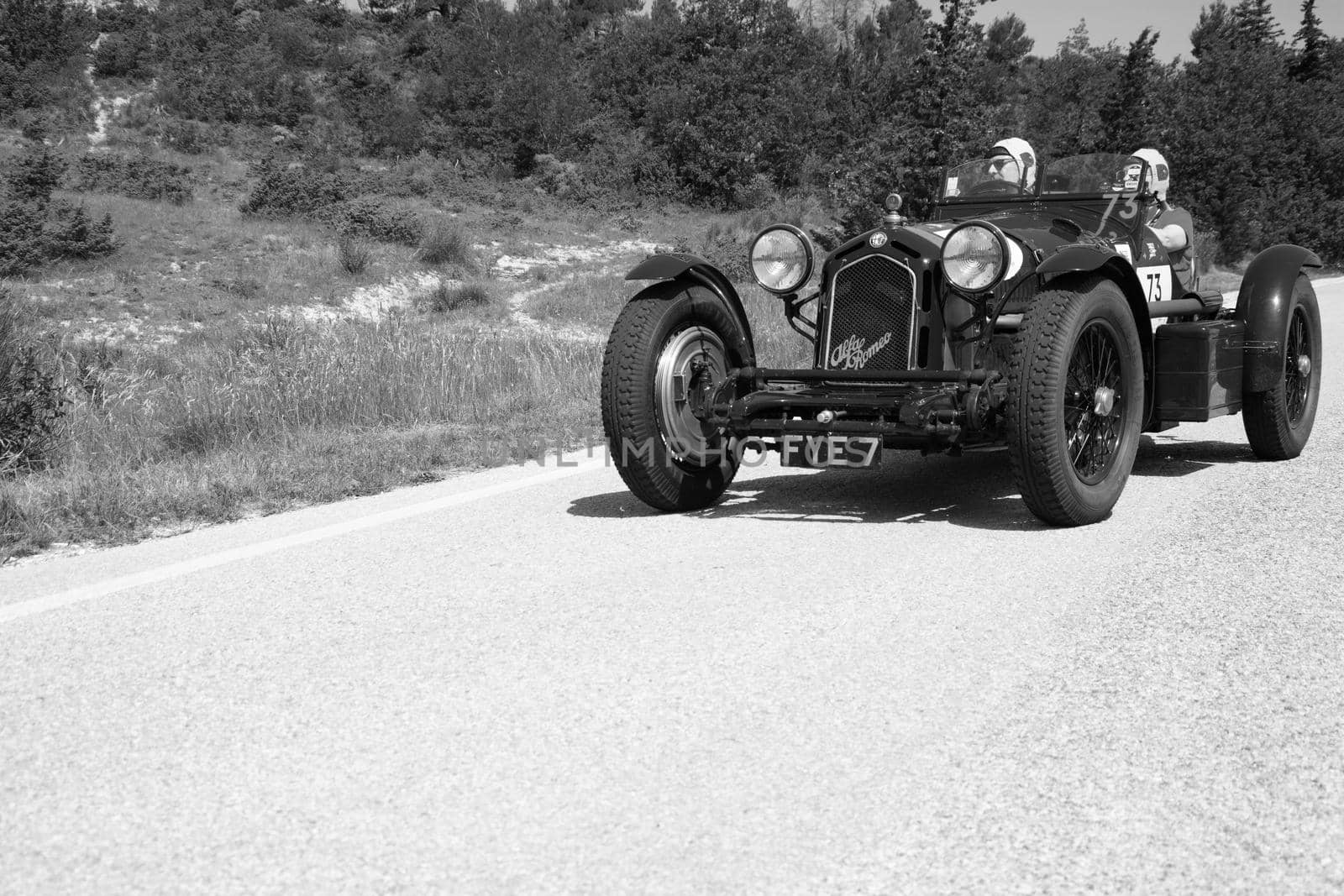 URBINO - ITALY - JUN 16 - 2022 : ALFA ROMEO 8C 2300 MONZA 1933 on an old racing car in rally Mille Miglia 2022 the famous italian historical race (1927-1957