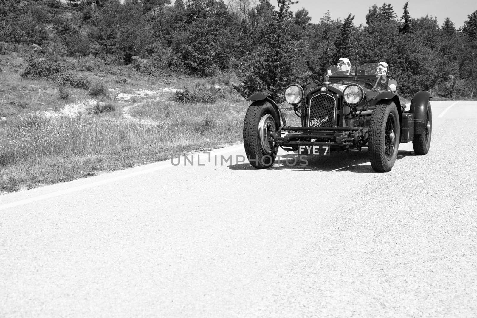 URBINO - ITALY - JUN 16 - 2022 : ALFA ROMEO 8C 2300 MONZA 1933 on an old racing car in rally Mille Miglia 2022 the famous italian historical race (1927-1957