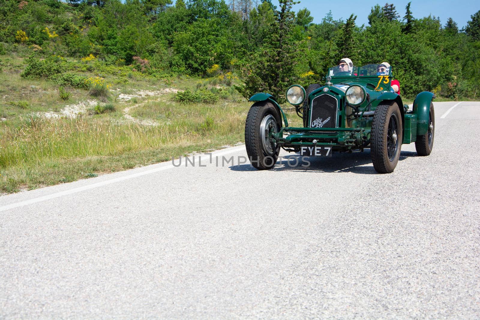 URBINO - ITALY - JUN 16 - 2022 : ALFA ROMEO 8C 2300 MONZA 1933 on an old racing car in rally Mille Miglia 2022 the famous italian historical race (1927-1957