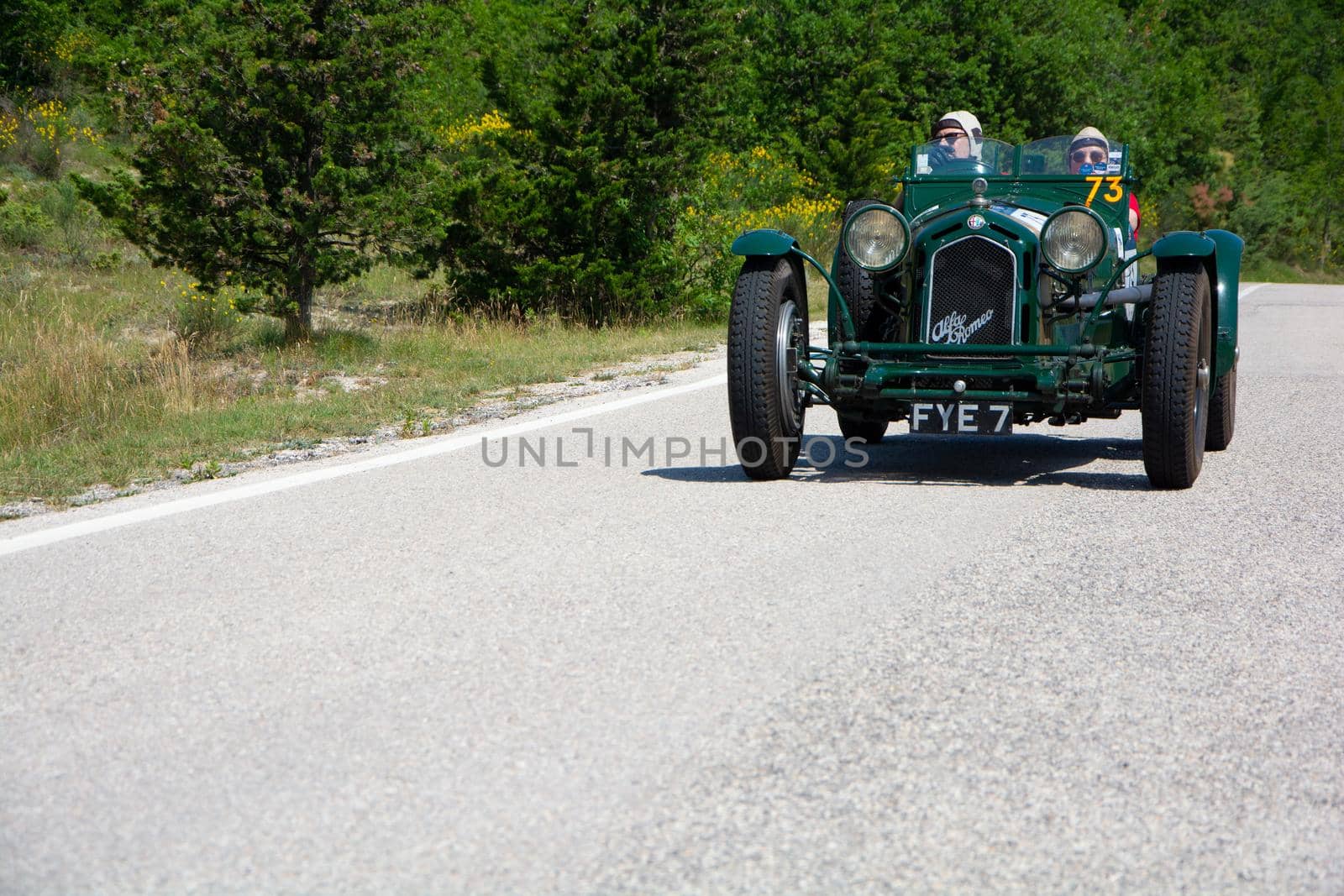 URBINO - ITALY - JUN 16 - 2022 : ALFA ROMEO 8C 2300 MONZA 1933 on an old racing car in rally Mille Miglia 2022 the famous italian historical race (1927-1957