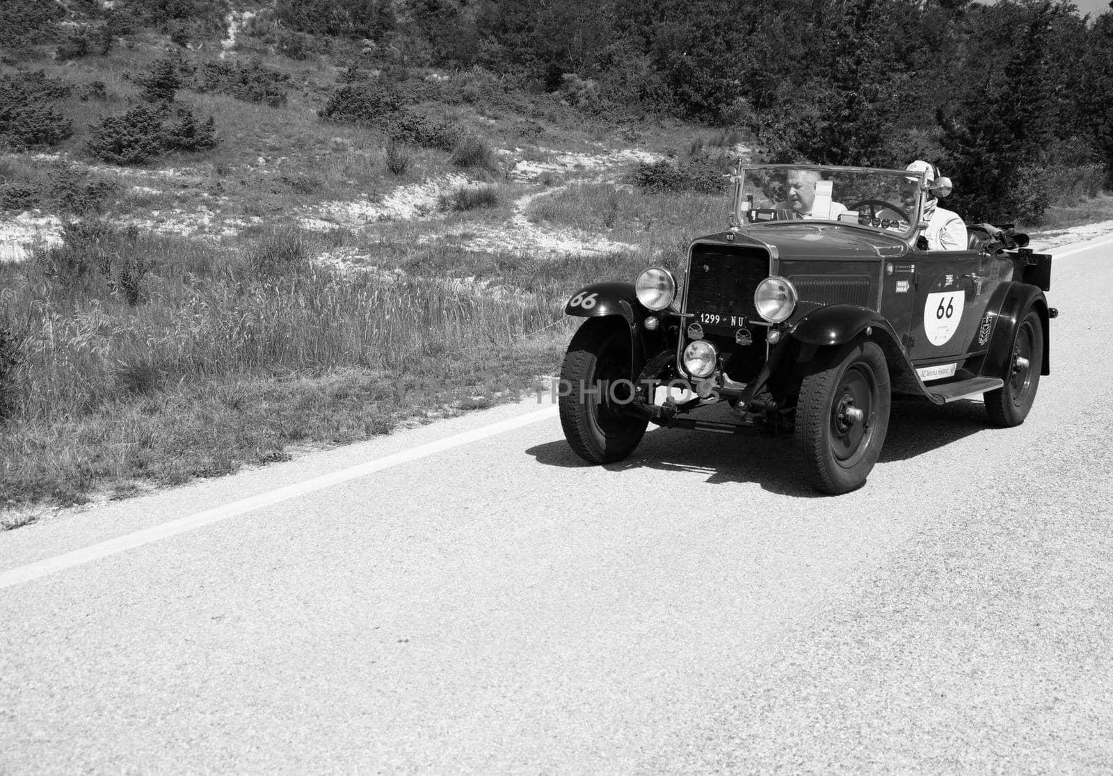 URBINO - ITALY - JUN 16 - 2022 : FIAT 514 S 1931 on an old racing car in rally Mille Miglia 2022 the famous italian historical race (1927-1957