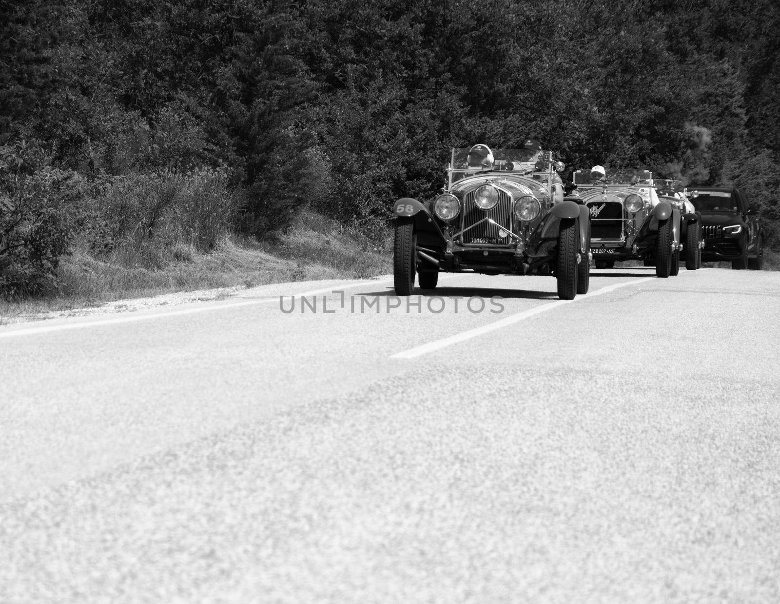 URBINO - ITALY - JUN 16 - 2022 : ALFA ROMEO 6C 1500 SUPER SPORT 1929 on an old racing car in rally Mille Miglia 2022 the famous italian historical race (1927-1957