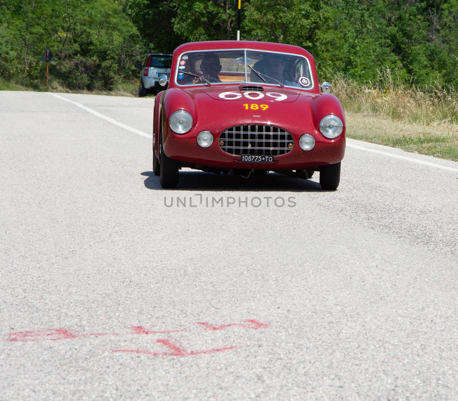 URBINO - ITALY - JUN 16 - 2022 : ERMINI 1100 BERLINETTA MOTTO 1950 on an old racing car in rally Mille Miglia 2022 the famous italian historical race (1927-1957